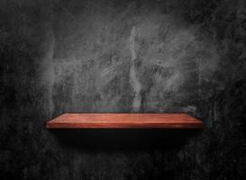 Wooden shelf on concrete wall texture background with clipping path. Blank for design photo