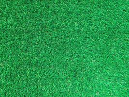 Artificial grass background for design, top view photo