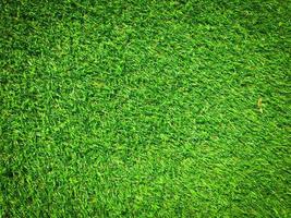 Artificial green grass texture background with copy space for work and design. photo