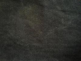 Black denim texture background with copy space for design photo