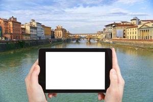 tourist photographs Ponte Vecchio in Florence photo