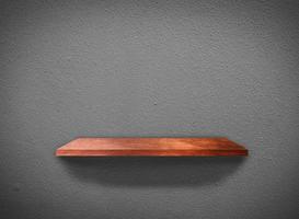 Hardwood shelves on concrete wall texture in minimal Style  background with clipping path for design photo