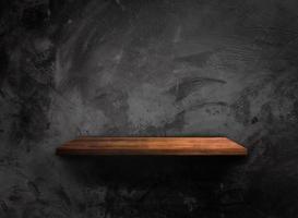 Wooden shelf on concrete wall texture background with clipping path. Blank for design photo