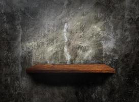 Wooden shelf on concrete wall texture background with clipping path. Blank for design photo