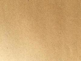 Old brown paper texture background or cardboard with copy space for design. photo
