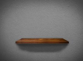 Hardwood shelves on concrete wall texture in minimal Style  background with clipping path for design photo