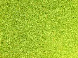 Artificial grass background for design, top view photo