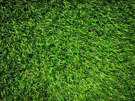 Artificial green grass texture background with copy space for work and design. photo