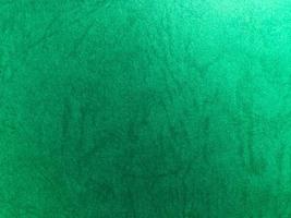 Green paper texture background with pattern for design. Copy space for text and work photo