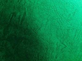 Green paper texture background with pattern for design. Copy space for text and work photo