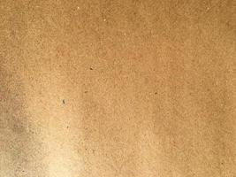Old brown paper texture background or cardboard with copy space for design. photo