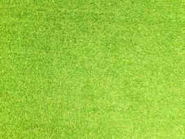 Artificial grass background for design, top view photo