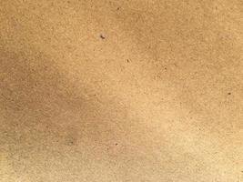 Old brown paper texture background or cardboard with copy space for design. photo