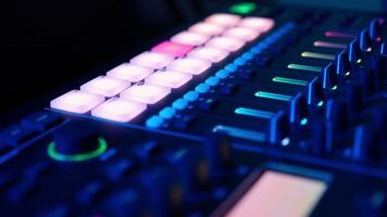 Professional DJ Plays a Beat Sampler with Color Drum Pads and Samples in Studio Environment. Beatmaker Plays edm Tracks on Party in a Nightclub. Electronic Musical Instrument. Unrecognizable person video