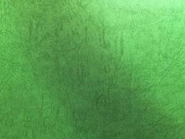 Green paper texture background with pattern for design. Copy space for text and work photo