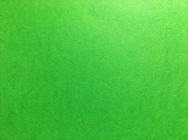 fondo de textura de página de papel verde claro para el diseño. vista superior foto