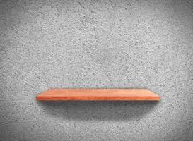 Hardwood shelves on concrete wall texture in minimal Style  background with clipping path for design photo