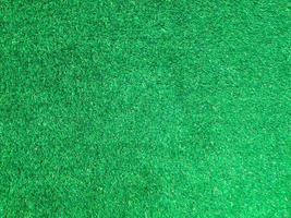 Artificial grass background for design, top view photo