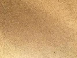 Old brown paper texture background or cardboard with copy space for design. photo