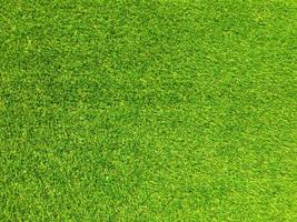 Artificial grass background for design, top view photo