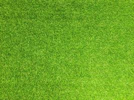 Artificial grass background for design, top view photo