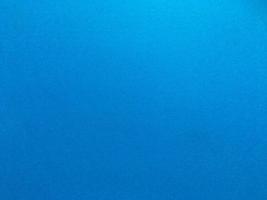 Minimal blue paper texture background with pattern for work and design photo