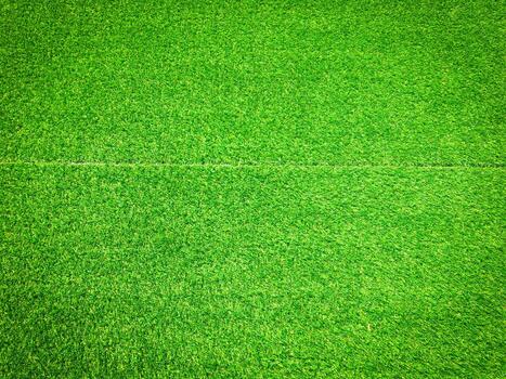 Artificial grass background for design, top view photo