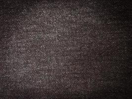 Black denim texture background with copy space for design photo