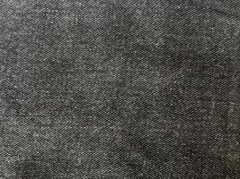 Black denim texture background with copy space for design photo