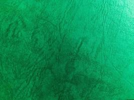 Green paper texture background with pattern for design. Copy space for text and work photo