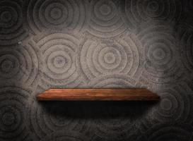 Wooden shelf on concrete wall texture background with clipping path. Blank for design photo