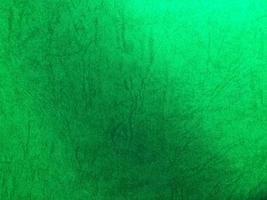 Green paper texture background with pattern for design. Copy space for text and work photo