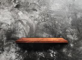 Wooden shelf on concrete wall texture background with clipping path. Blank for design photo