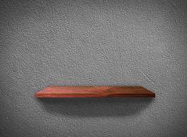 Hardwood shelves on concrete wall texture in minimal Style  background with clipping path for design photo