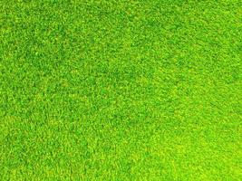 Artificial grass background for design, top view photo