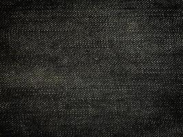 Black denim texture background with copy space for design photo