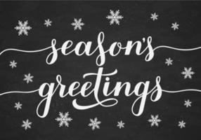 Seasons Greetings calligraphy hand lettering on chalkboard background with snowflakes. Christmas and New Year typography poster. Easy to edit vector template for greeting card, banner, flyer, etc.