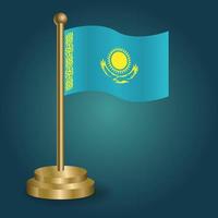bandera nacional de kazajstán en el poste dorado sobre fondo oscuro aislado de gradación. bandera de mesa, ilustración vectorial vector