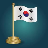 bandera nacional de corea del sur en el polo dorado sobre fondo oscuro aislado de gradación. bandera de mesa, ilustración vectorial vector