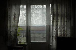 Window in room. Curtains on window. photo