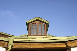 Window in old house. Ancient architecture in Russia. photo