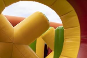 Inflatable children's playground. Obstacle course made of rubber. Inflated construction photo