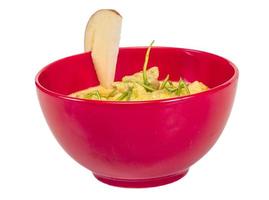 Yellow Curry Chicken in a bowl on white background photo