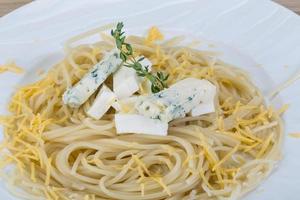 Cheese pasta on the plate photo