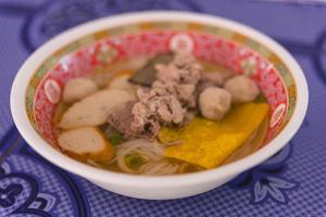 Thai soup in a bowl photo