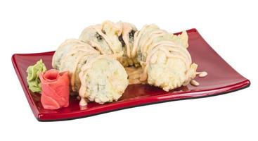 Japanese Cuisine - Tempura Maki Sushi Deep Fried Roll made of salmon, tobiko roe and Cream Cheese inside photo