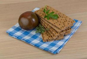 Crispbread on wooden background photo