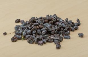 Barberries on wooden background photo