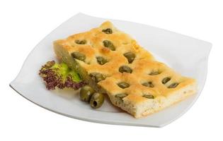 Olive bread on the plate and white background photo