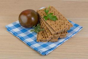 Crispbread on wooden background photo